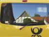 Mein Haus im Postauto . my house in the postcar